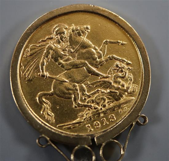 A 1913 gold sovereign in 9ct gold pendant mount.